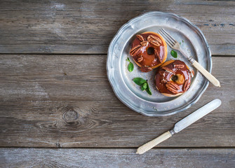 Cinnamon donuts with caramel icing and pekans served with fresh