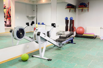 Fototapeta na wymiar Fitness gym with sports equipment