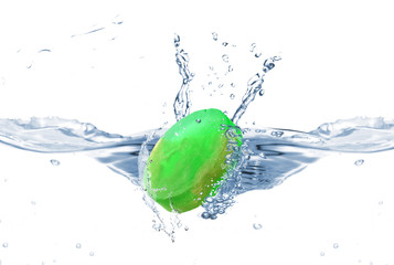 Aromatic green soap in water splash