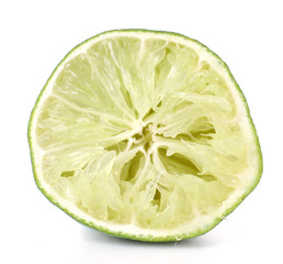 Squeezed lime isolated on white