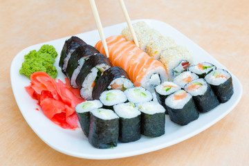 white plate with set of rolls