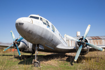 Old plane on background sky