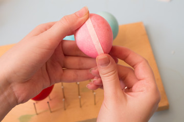 glue  white stripe on  pink egg