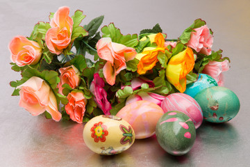 different Easter eggs and flowers