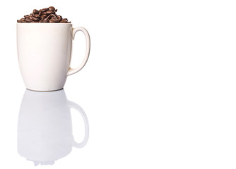 Roasted coffee bean in white mug