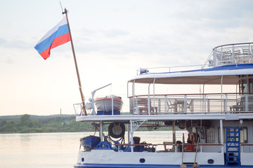 passenger boat with flag of Russia