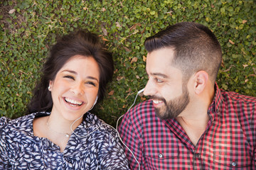 Fototapeta premium Happy couple relaxing at a park