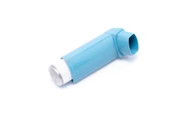 Asthma inhaler isolated on a white background