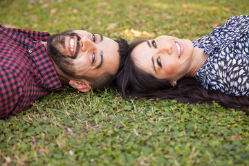 Cute couple relaxing in a park