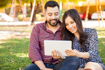 Couple using a tablet computer