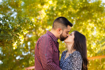 Fototapeta premium Romantic couple kissing each other