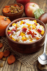 Sweet pilaf with pumpkin, apples and dried fruit