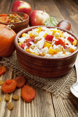 Sweet pilaf with pumpkin, apples and dried fruit