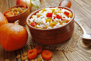 Sweet pilaf with pumpkin, apples and dried fruit