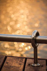 stainless steel balcony with bokeh background.