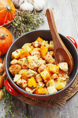 Chicken stew with pumpkin, potatoes and spices