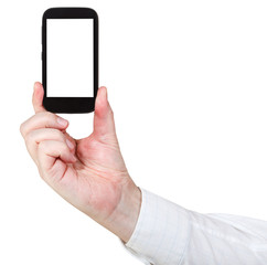 businessman holds touchscreen phone