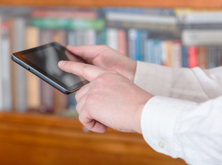 businessman finger pressing tablet pc screen