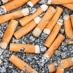 background from cigarette stubs and ash