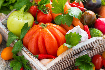 harvest seasonal vegetables in a wooden box, horizontal