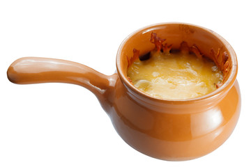 Roast with vegetables, meat and cheese in pottery. isolation
