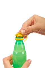 Hand opens a plastic bottle