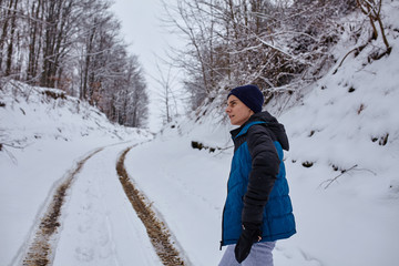 Teenager walking on wintertime