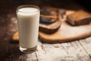 Milk and bread on table. still life