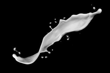 milk splash isolated on black