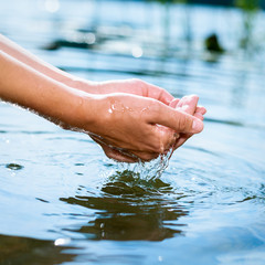 Fototapeta premium Holding water in cupped hands