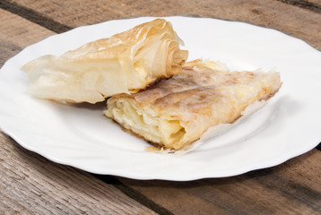 Close up of two piece cheese pie
