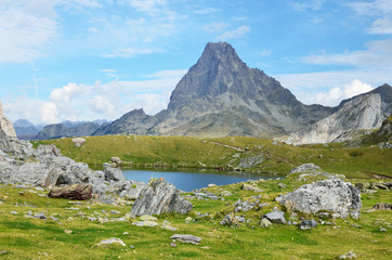Fototapeta na wymiar Mountain lake Casterau against the peak du Midi d'Ossau