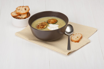 Bowl Of Vegetable Soup. Roasted Courgette Slices. Croutons. Whit