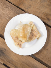 Top view of cheese pie pieces on plate