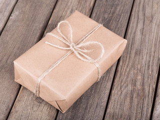 Package Wrapped in Brown Paper and String