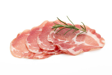 Dried pig meat slices. Delicatess.