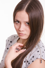 Portrait of serious girl touch the hair