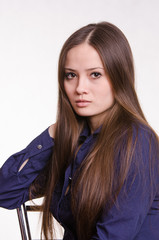 Portrait of girl in a blue blouse