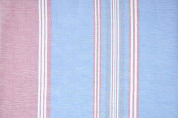 Closeup detail of blue, red and white striped fabric