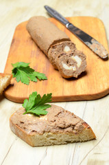 Roll pate, slices of toasted bread