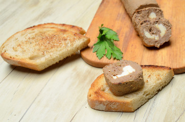 Roll pate, slices of toasted bread