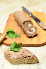 Roll pate, slices of toasted bread