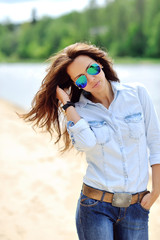 Fashion beautiful woman portrait wearing sunglasses