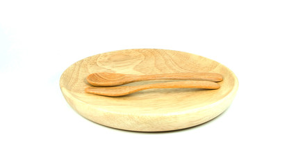 Wooden dish, spoon and fork. Isolated on white background