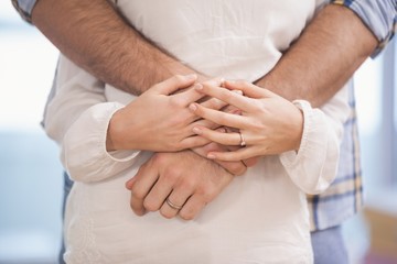 Fototapeta na wymiar Close up of young couple hugging