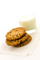 oatmeal raisin cookies and glass of milk