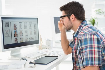Fototapeta premium Focused businessman using computer monitor