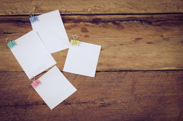 paper note on wooden background