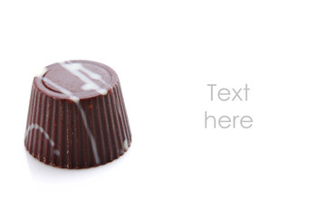 chocolate candy on white background with place for text