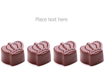 chocolate candy on white background with place for text